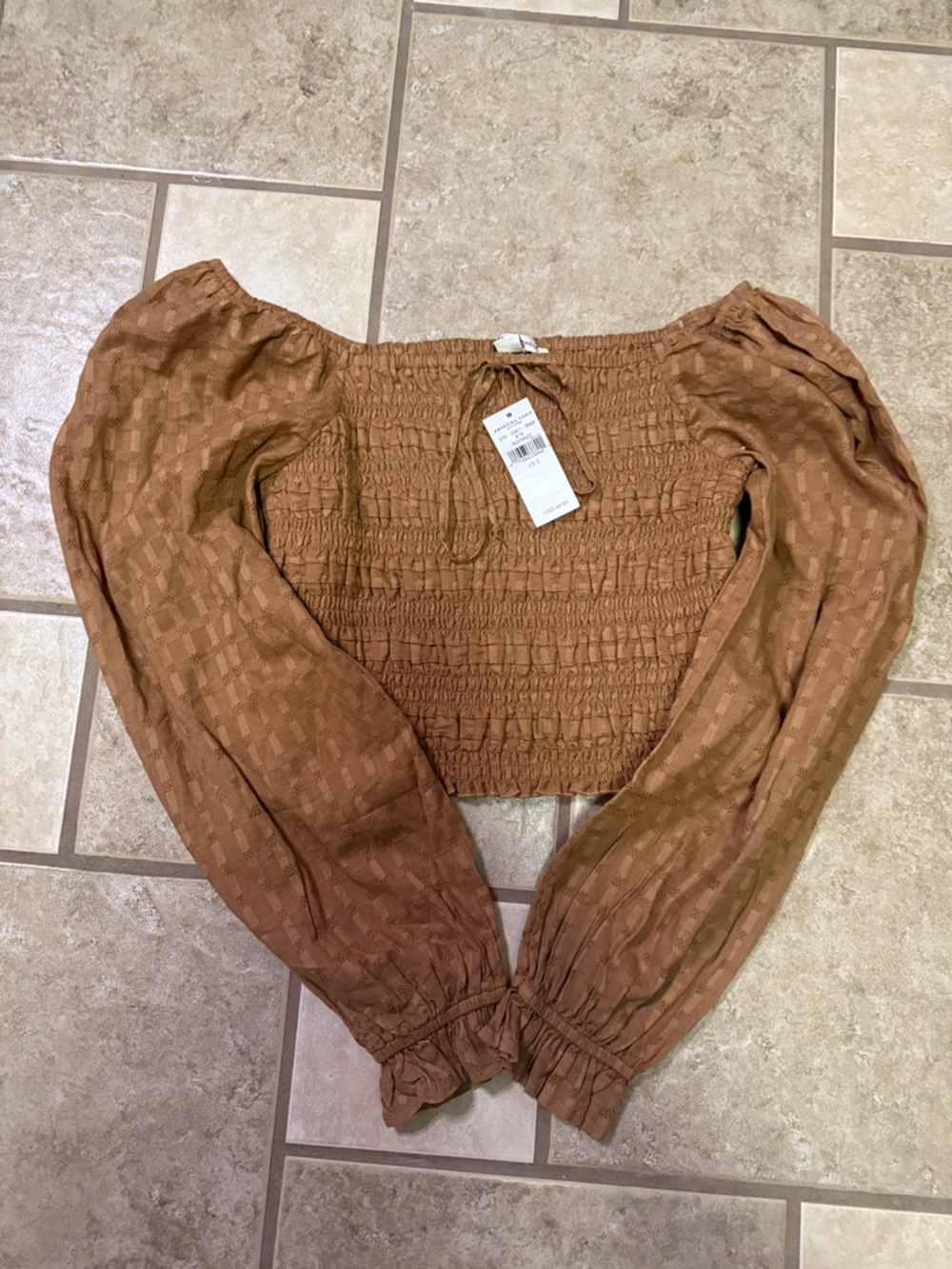 NWT American Eagle Smocked Off-Shoulder Long Sleeve Top never worn, cropped.